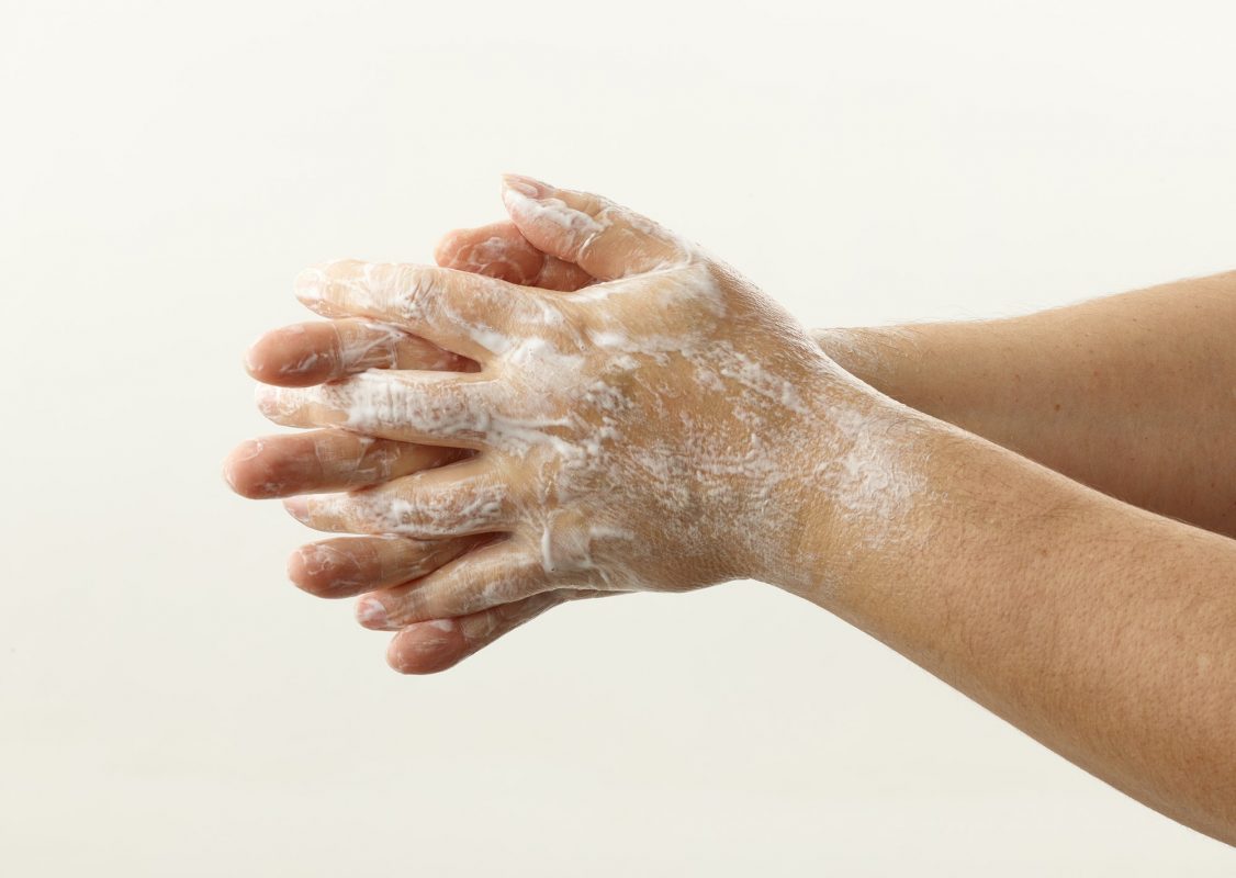hands with soap foam
